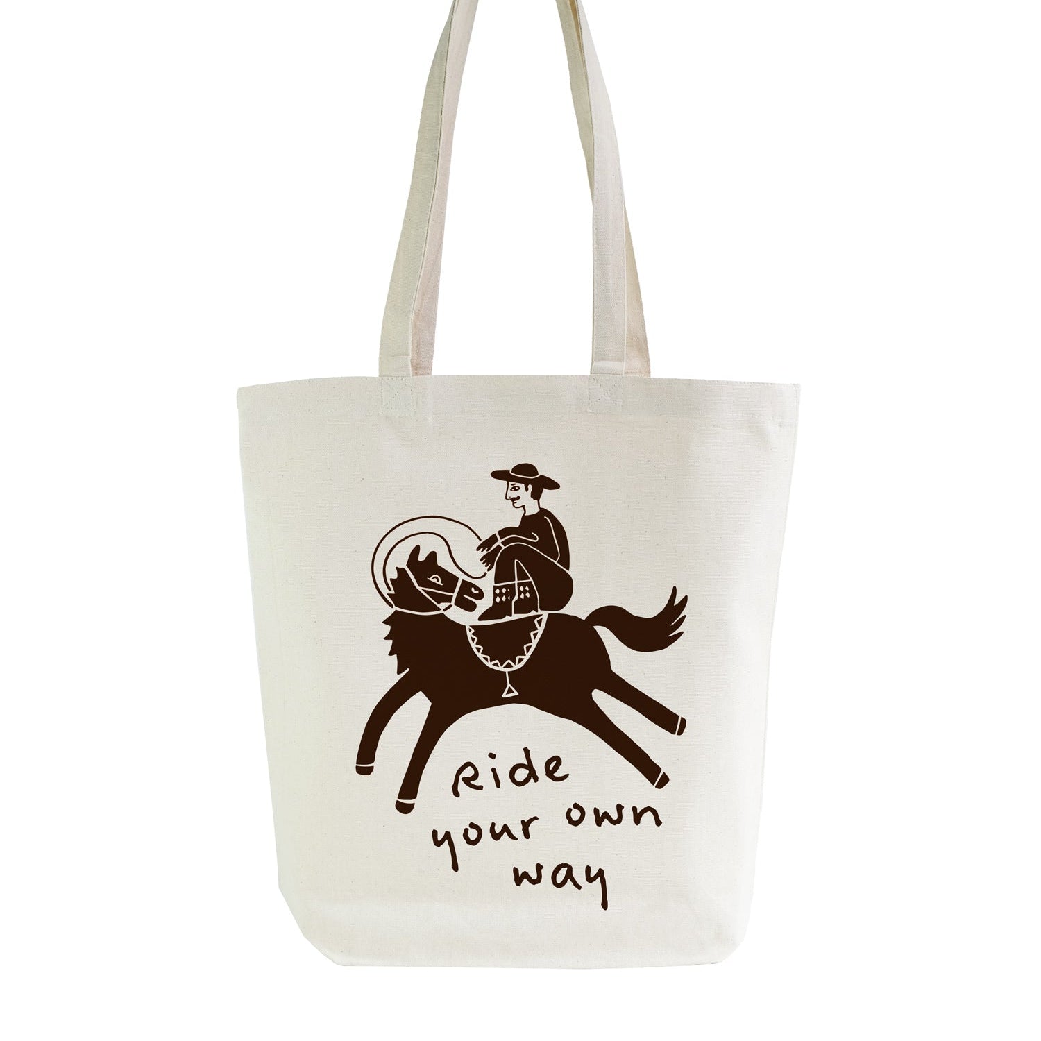 Tote bag with a graphic of a person riding a horse and the text 'Ride your own way' on a white background.